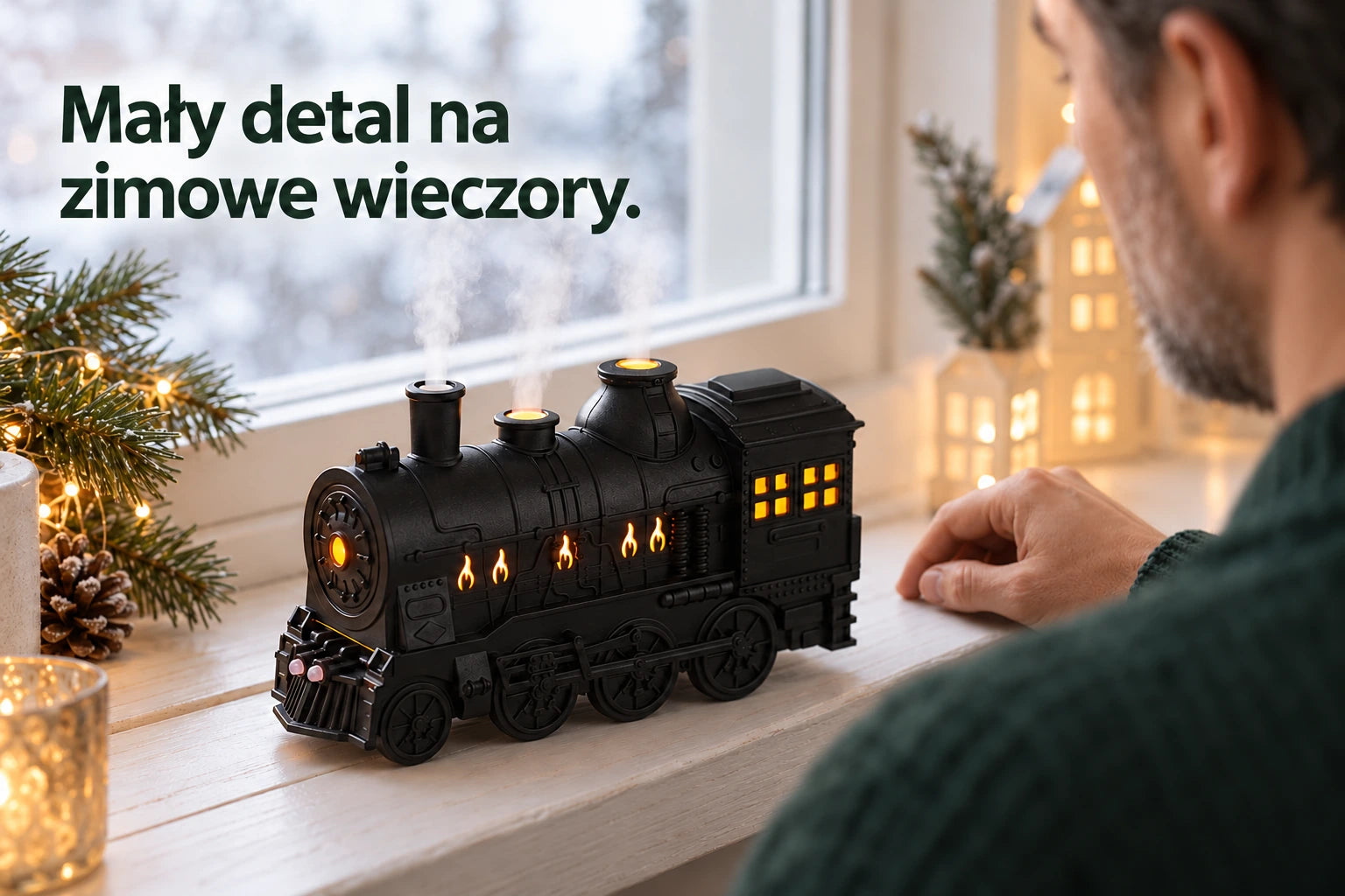 Osoba przy lokomotywie na zimowym parapecie. Napis: Mały detal na zimowe wieczory.